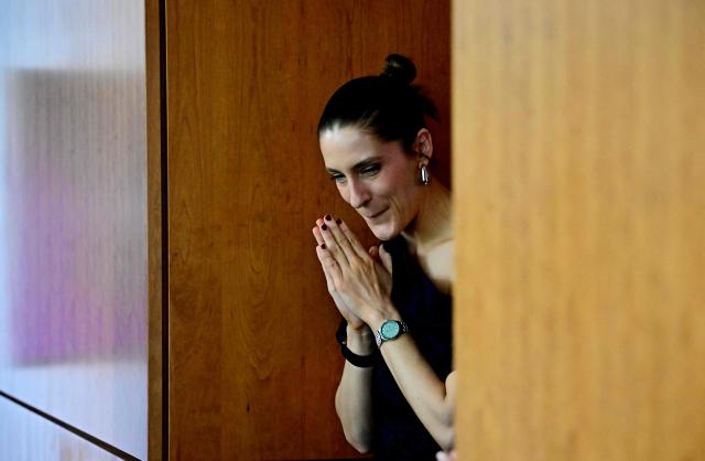 German former tennis player Andrea Petkovic reacts on the sidelines of a press conference with Czech Republic's Karolina Muchova (not pictured) in Berlin on June 13, 2026, ahead of the WTA500 Berlin Tennis Open tournament starting on June 15. (Photo by Tobias SCHWARZ / AFP)