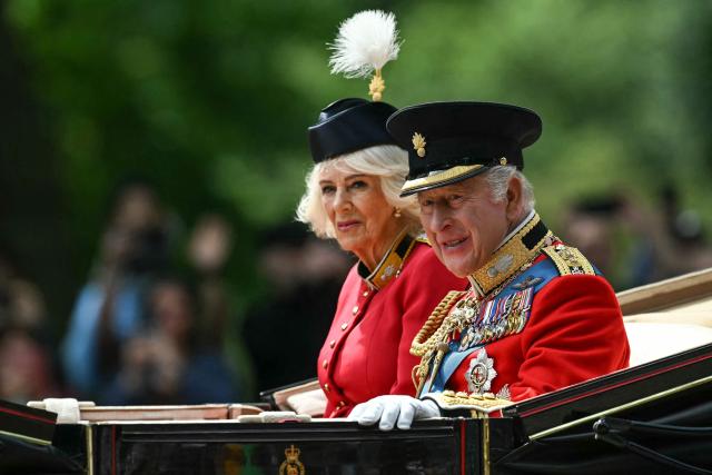 Britain's King Charles III and Britain's Queen Camilla arrive to attend the King's Birthday Parade "Trooping the Colour" in London on June 13, 2026. (Photo by JUSTIN TALLIS / AFP)