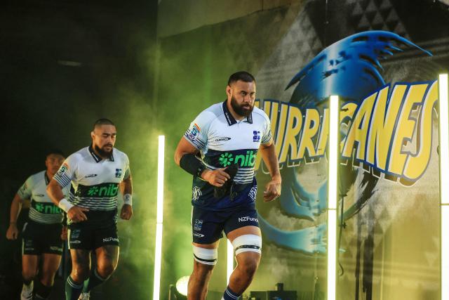 Blues Patrick Tuipulotu leads out his team during the Super Rugby Pacific semi-final match between the Wellington Hurricanes and Auckland Blues in Wellington on June 13, 2026. (Photo by Grant Down / AFP)