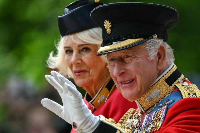 Britain's King Charles III and Britain's Queen Camilla arrive to attend the King's Birthday Parade "Trooping the Colour" in London on June 13, 2026. (Photo by JUSTIN TALLIS / AFP)