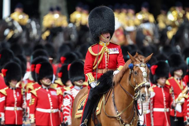 A Grenadier Guardsman shouts during the King's Birthday Parade "Trooping the Colour" in London on June 13, 2026. (Photo by Toby Shepheard / AFP)