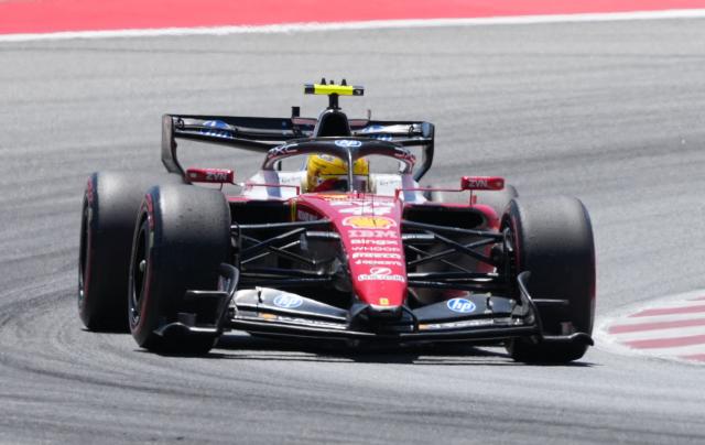 Ferrari's British driver Lewis Hamilton takes part in the third practice session at the Circuit de Catalunya ahead of the Catalonia Formula One Grand Prix in Montmelo, on the outskirts of Barcelona on June 13, 2026. (Photo by Manaure QUINTERO / AFP)