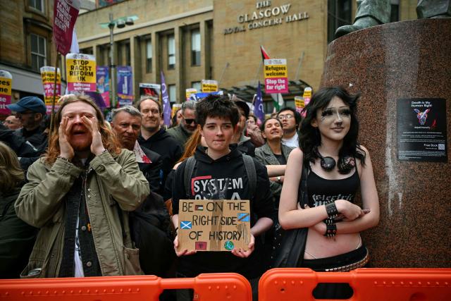 EDITORS NOTE: Graphic content / People take part in an anti-racism demonstration in central Glasgow, Scotland on June 13, 2026. (Photo by ANDY BUCHANAN / AFP)