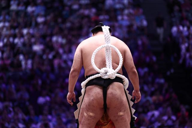 A Sumo wrestler take parts in the opening ceremony ahead of the day 1 of the 2026 MUFG Paris Sumo Tournament, in Paris on June 13, 2026. (Photo by Behrouz MEHRI / AFP)