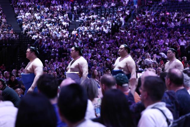 Sumo wrestlers take part in the opening ceremony ahead of the day 1 of the 2026 MUFG Paris Sumo Tournament, in Paris on June 13, 2026. (Photo by Behrouz MEHRI / AFP)