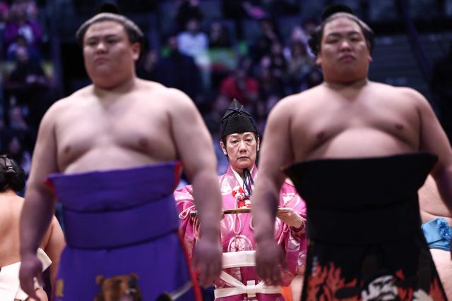 Sumo wrestlers take part in the opening ceremony ahead of the day 1 of the 2026 MUFG Paris Sumo Tournament, in Paris on June 13, 2026. (Photo by Behrouz MEHRI / AFP)