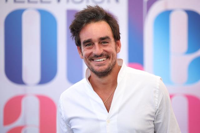 French comedian Kevin Levy poses during a photocall for the TV series "Demain nous appartient" during the 65th Monte-Carlo Television Festival in Monaco on June 13, 2026. (Photo by Valery HACHE / AFP)