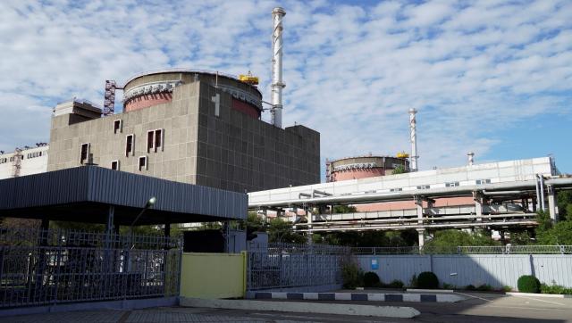 (FILES) This photo taken on September 11, 2022 shows a general view of the Zaporizhzhia Nuclear Power Plant in Enerhodar (Energodar), Zaporizhzhia Oblast, amid the ongoing Russian military action in Ukraine. The Russian-occupied Zaporizhzhia nuclear power plant in Ukraine was reconnected to the grid on June 13, 2026, nearly three days after a strike cut off its external electricity supply, the UN nuclear watchdog said. Power was restored after repairs to a back-up line, carried out while a local ceasefire was in place, the International Atomic Energy Agency (IAEA) said in a post on X. (Photo by AFP)