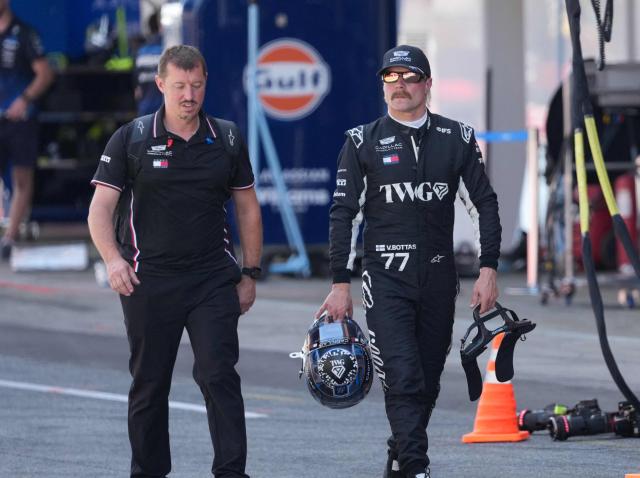 Cadillac's Finnish driver Valtteri Bottas (R) prepares to compete in the qualifying session at the Circuit de Catalunya ahead of the Catalonia Formula One Grand Prix in Montmelo, on the outskirts of Barcelona, on June 13, 2026. (Photo by Manaure QUINTERO / POOL / AFP)