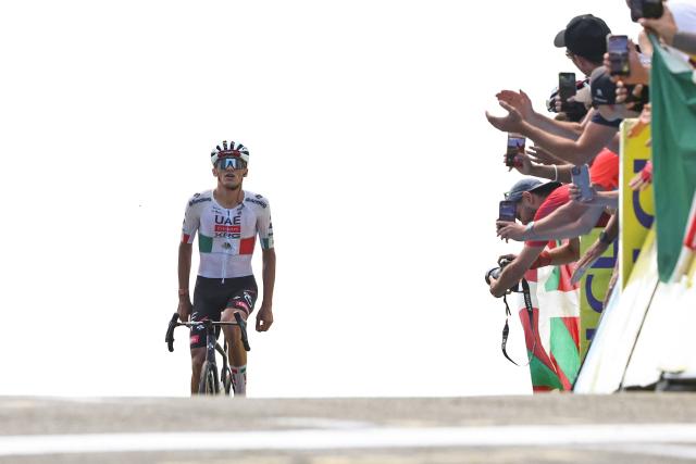 UAE Team Emirates XRG's Mexican rider Isaac Del Toro Romero cycles to the finish line to win the 7th stage of the Tour Auvergne-Rhone-Alpes cycling race (formerly known as the Criterium du Dauphine), 133,6km between La Bridoire and Grand Colombier in the French Alps on June 13, 2026. (Photo by Anne-Christine POUJOULAT / AFP)
