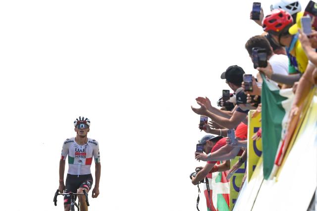 UAE Team Emirates XRG's Mexican rider Isaac Del Toro Romero cycles to the finish line to win the 7th stage of the Tour Auvergne-Rhone-Alpes cycling race (formerly known as the Criterium du Dauphine), 133,6km between La Bridoire and Grand Colombier in the French Alps on June 13, 2026. (Photo by Anne-Christine POUJOULAT / AFP)