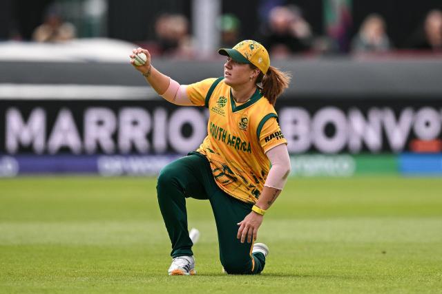 South Africa's Nadine de Klerk comes up with the ball after making the catch against Australia's Annabel Sutherland (not pictured) during the ICC Women's T20 cricket world cup 2026 game between Australia and South Africa, at Old Trafford in Manchester, north-west England on June 13, 2026. (Photo by Oli SCARFF / AFP)
