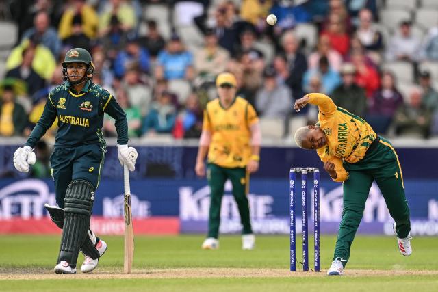 South Africa's Nonkululeko Mlaba (R) bowls during the ICC Women's T20 cricket world cup 2026 game between Australia and South Africa, at Old Trafford in Manchester, north-west England on June 13, 2026. (Photo by Oli SCARFF / AFP)
