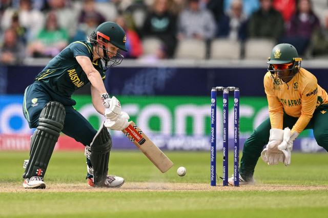 Australia's Nicola Carey (L) plays a shot during the ICC Women's T20 cricket world cup 2026 game between Australia and South Africa, at Old Trafford in Manchester, north-west England on June 13, 2026. (Photo by Oli SCARFF / AFP)