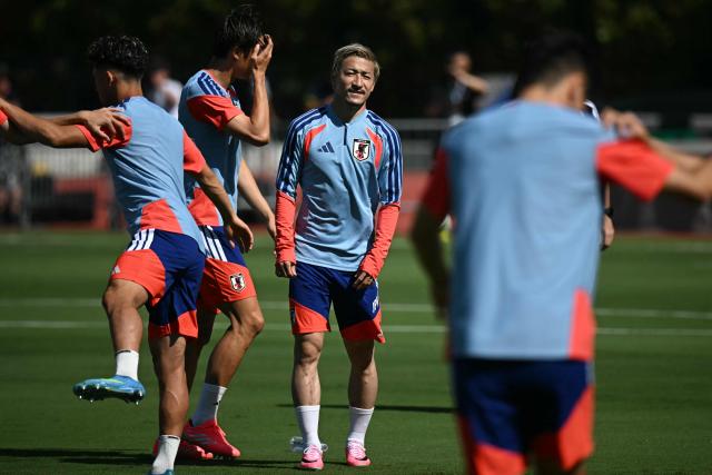 Japan's forward #11 Daizen Maeda (C) takes part in a training session ahead of Japan's 2026 World Cup football tournament Group F football match against the Netherlands in Dallas on June 13, 2026.  (Photo by Paul ELLIS / AFP)