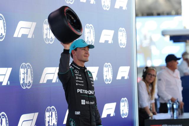Mercedes' British driver George Russell celebrates pole position after the qualifying session at the Circuit de Catalunya ahead of the Catalonia Formula One Grand Prix in Montmelo, on the outskirts of Barcelona, on June 13, 2026. (Photo by Lluis GENE / AFP)