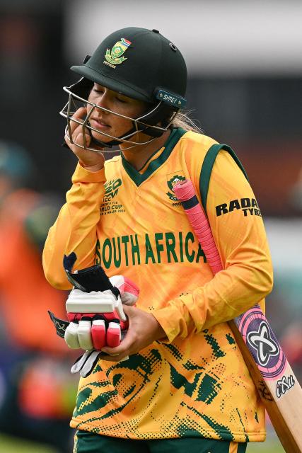 South Africa's Suné Luus leaves the pitch after being dismissed for one, during the ICC Women's T20 cricket world cup 2026 game between Australia and South Africa, at Old Trafford in Manchester, north-west England on June 13, 2026. (Photo by Oli SCARFF / AFP)