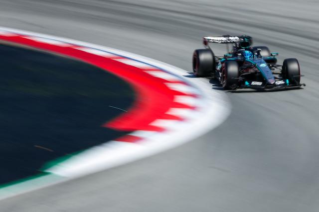 Mercedes' British driver George Russell takes part in the qualifying session at the Circuit de Catalunya ahead of the Catalonia Formula One Grand Prix in Montmelo, on the outskirts of Barcelona, on June 13, 2026. (Photo by Josep LAGO / AFP)