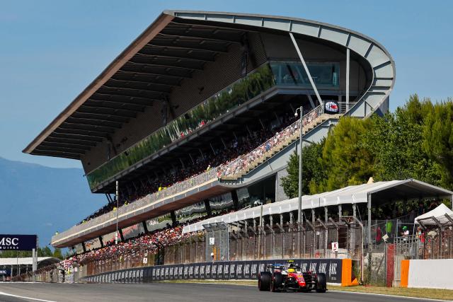 Ferrari's British driver Lewis Hamilton takes part in the qualifying session at the Circuit de Catalunya ahead of the Catalonia Formula One Grand Prix in Montmelo, on the outskirts of Barcelona, on June 13, 2026. (Photo by Josep LAGO / AFP)
