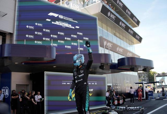 Mercedes' British driver George Russell celebrates pole position after the qualifying session at the Circuit de Catalunya ahead of the Catalonia Formula One Grand Prix in Montmelo, on the outskirts of Barcelona, on June 13, 2026. (Photo by Manaure QUINTERO / AFP)