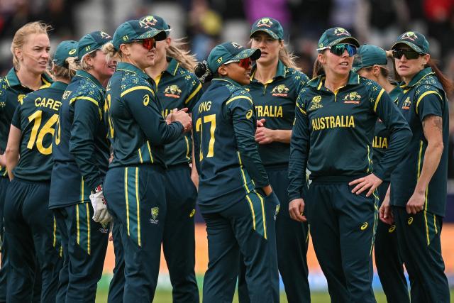 Australia celebrate the dismissal of South Africa's Annerie Dercksen (not pictured) during the ICC Women's T20 cricket world cup 2026 game between Australia and South Africa, at Old Trafford in Manchester, north-west England on June 13, 2026. (Photo by Oli SCARFF / AFP)