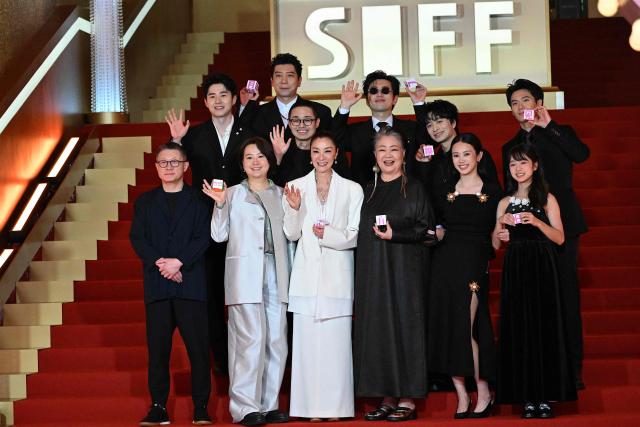 Cast and crew of the movie “Mo Fang Xiao Jie” arrive on the red carpet of the 28th Shanghai International Film Festival (SIFF) in Shanghai, on June 13, 2026. (Photo by Jade Gao / AFP)