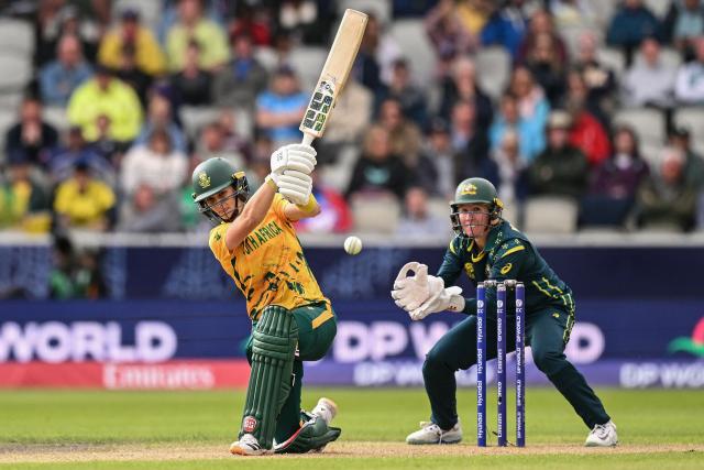 South Africa's captain Laura Wolvaardt (L) bats during the ICC Women's T20 cricket world cup 2026 game between Australia and South Africa, at Old Trafford in Manchester, north-west England on June 13, 2026. (Photo by Oli SCARFF / AFP)