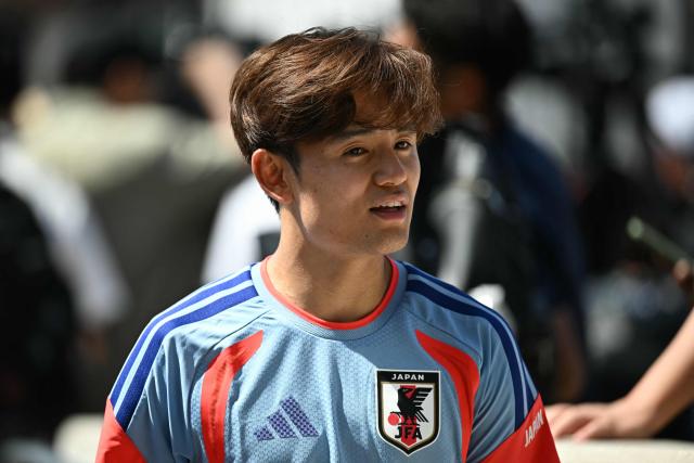 Japan's midfielder #08 Takefusa Kubo  arrives for an MD-1 training session on the eve of the 2026 World Cup Group F football match between the Netherlands and Japan, at the Dallas Stadium in Arlington on June 13, 2026. (Photo by Paul ELLIS / AFP)