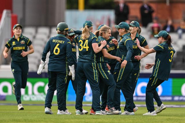 Australia celebrate after dismissing South Africa's captain Laura Wolvaardt (not pictured) during the ICC Women's T20 cricket world cup 2026 game between Australia and South Africa, at Old Trafford in Manchester, north-west England on June 13, 2026. (Photo by Oli SCARFF / AFP)