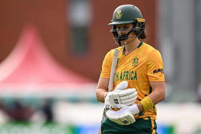 South Africa's captain Laura Wolvaardt leaves after being dismissed during the ICC Women's T20 cricket world cup 2026 game between Australia and South Africa, at Old Trafford in Manchester, north-west England on June 13, 2026. (Photo by Oli SCARFF / AFP)