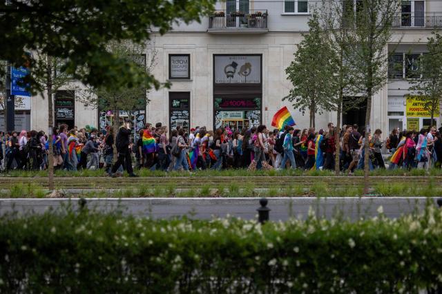 Participants of the Warsaw Pride parade walk in the streets of Warsaw, Poland, on June 13, 2026. (Photo by Wojtek RADWANSKI / AFP)