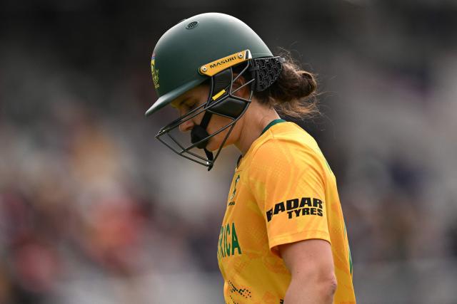 South Africa's captain Laura Wolvaardt leaves after being dismissed during the ICC Women's T20 cricket world cup 2026 game between Australia and South Africa, at Old Trafford in Manchester, north-west England on June 13, 2026. (Photo by Oli SCARFF / AFP)