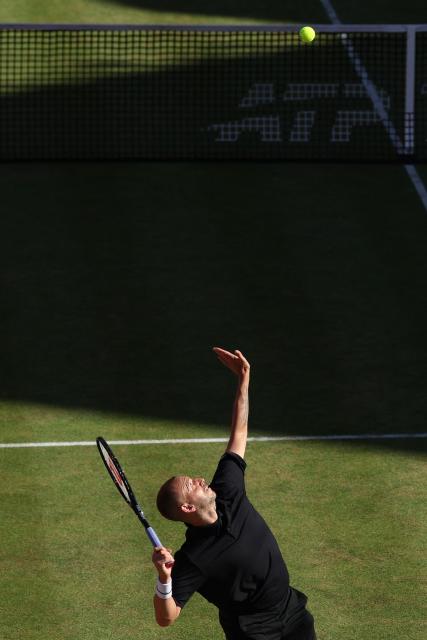 Britain's Dan Evans during his men's singles qualifiers tennis match at the HSBC Championships at Queen's Club in west London on June 13, 2026. Former British number one player Dan Evans is to retire from tennis, he announced on June 11, 2026, after this year's Wimbledon. (Photo by Adrian Dennis / AFP)