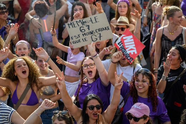 People take part in a feminist rally against patriarchy and the upcoming G7 summit in nearby Evian, in Lausanne on June 13, 2026. (Photo by Fabrice COFFRINI / AFP)