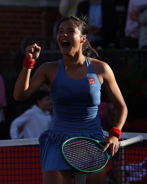 Britain's Emma Raducanu celebrates winning against US player Iva Jovic during their women's singles semi-final tennis match at the HSBC WTA Championships at Queen's Club in west London on June 13, 2026. (Photo by Adrian Dennis / AFP)