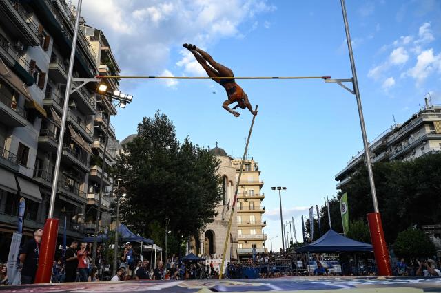 Italy's Malavisi Sonia competes in the International pole vault competition entitled "Fly in SKg sky" next to Arch of Galerius, in Thessaloniki on June 13, 2026. (Photo by Sakis Mitrolidis / AFP)