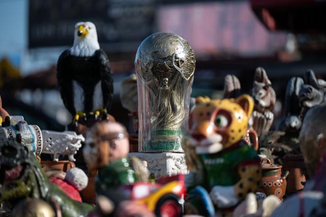 A replica of the FIFA trophy is in display for sale at the San Ysidro crossing port on the Mexican side of the border in Tijuana on June 13, 2026. (Photo by Guillermo Arias / AFP)