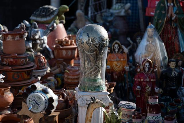 A replica of the FIFA trophy is in display for sale at the San Ysidro crossing port on the Mexican side of the border in Tijuana on June 13, 2026. (Photo by Guillermo Arias / AFP)