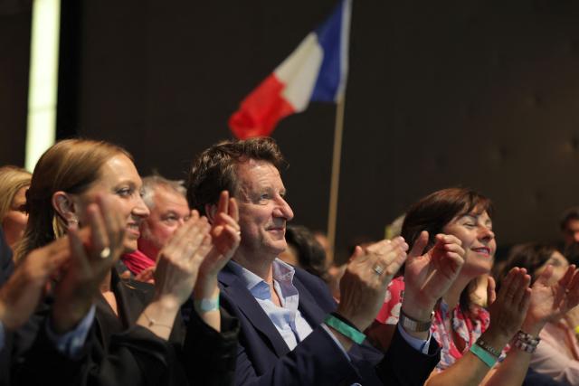 (From L) Place Publique MEP Aurore Lalucq, French green party Les Ecologists senator Yannick Jadot, and the president of the French administrativ region Occitanie and Socialist party member Carole Delga, applaud during a political rally of French centre-left party Place publique ahead of the April 2027 French presidential election in Aubervilliers, a northern suburb of Paris, on June 13, 2026. (Photo by Kenzo TRIBOUILLARD / AFP)