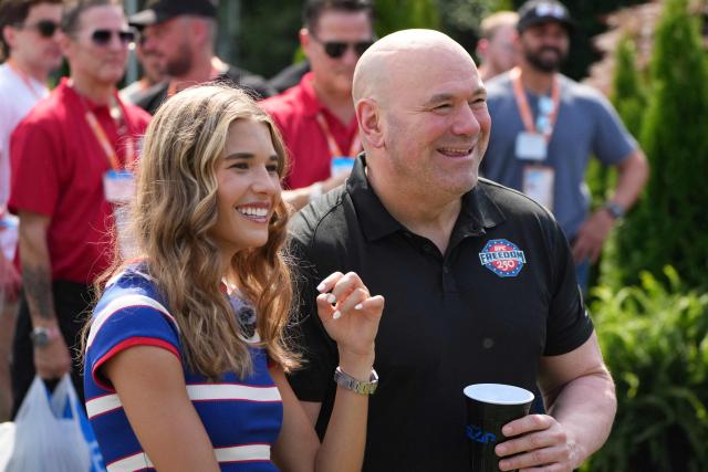 (L/R) Kai Trump, granddaughter of US President Donald Trump, and UFC President and CEO Dana White look on before a motorsports athlete and stunt performer does a motorcycle jump, ahead of Sunday's UFC Freedom 250 fights on the South Lawn of the White House in Washington, DC, on June 13, 2026. (Photo by Alex Brandon / POOL / AFP)