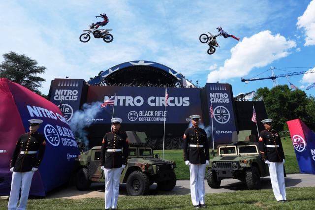 Stunt performers do a motorcycle jump, ahead of Sunday's UFC Freedom 250 fights on the South Lawn of the White House in Washington, DC, on June 13, 2026. (Photo by Alex Brandon / POOL / AFP)