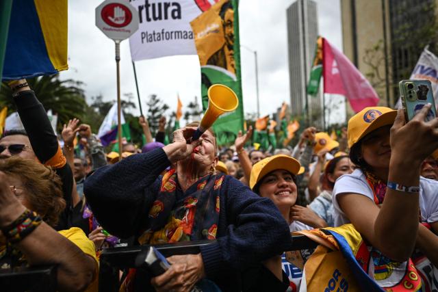 Supporters of Colombia's presidential candidate for the Pacto Historico party Ivan Cepeda, attend the closing rally of his campaign in Bogota on June 13, 2026. Colombia will hold the runoff presidential election on June 21. (Photo by Juan BARRETO / AFP)