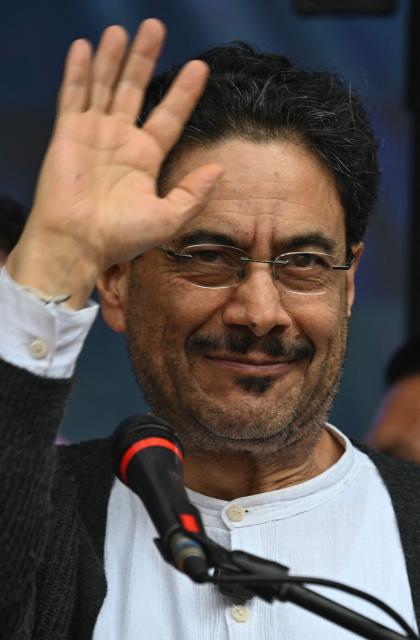 Colombia's presidential candidate for the Pacto Historico party Ivan Cepeda waves during his closing campaign rally in Bogota on June 13, 2026. Colombia will hold the runoff presidential election on June 21. (Photo by Juan BARRETO / AFP)