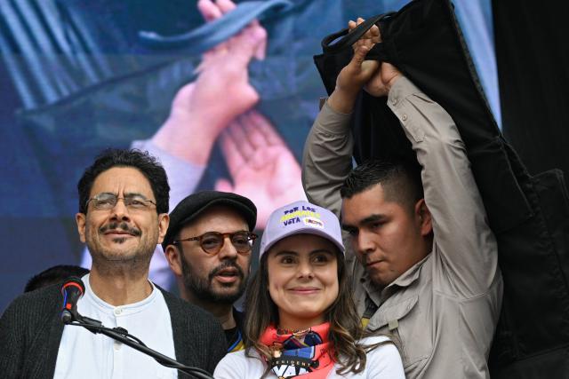 Colombia's presidential candidate for the Pacto Historico party Ivan Cepeda (L) looks on during his closing campaign rally in Bogota on June 13, 2026. Colombia will hold the runoff presidential election on June 21. (Photo by Juan BARRETO / AFP)