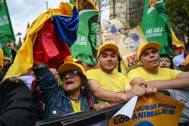 Supporters of Colombia's presidential candidate for the Pacto Historico party Ivan Cepeda, attend the closing rally of his campaign in Bogota on June 13, 2026. Colombia will hold the runoff presidential election on June 21. (Photo by Juan BARRETO / AFP)