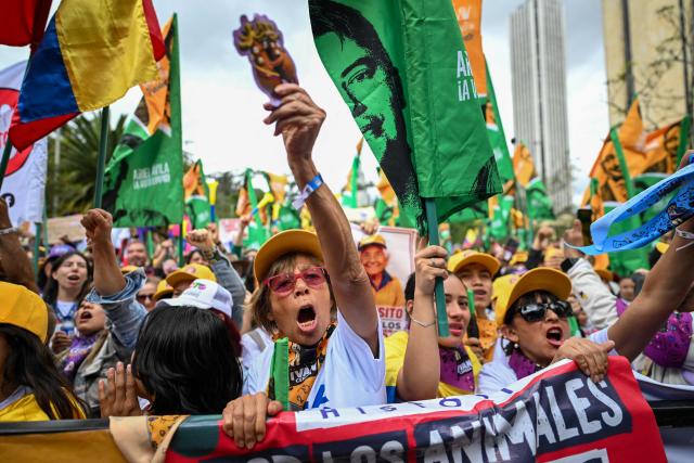 Supporters of Colombia's presidential candidate for the Pacto Historico party Ivan Cepeda, attend the closing rally of his campaign in Bogota on June 13, 2026. Colombia will hold the runoff presidential election on June 21. (Photo by Juan BARRETO / AFP)