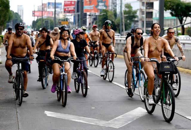 EDITORS NOTE: Graphic content / Cyclists participate in the 2026 World Naked Bike Ride in Guadalajara, Jalisco, Mexico, on June 13, 2026. (Photo by ULISES RUIZ / AFP)