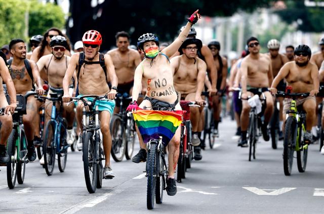 EDITORS NOTE: Graphic content / Cyclists participate in the 2026 World Naked Bike Ride in Guadalajara, Jalisco, Mexico, on June 13, 2026. (Photo by ULISES RUIZ / AFP)