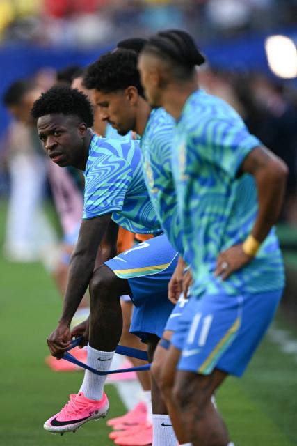 Brazil's forward #07 Vinicius Junior warms up ahead of the 2026 World Cup Group C football match between Brazil and Morocco at the New York/New Jersey Stadium in East Rutherford on June 13, 2026. (Photo by Mauro PIMENTEL / AFP)