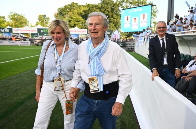 Racing 92' President Jacky Lorenzetti (C) walks along the pitch prior to the French Top14 rugby union playoff match between Section Paloise Bearn Pyrenees (Pau) and Racing 92 at Stade du Hameau in Pau, south-western France on June 13, 2026. (Photo by Gaizka IROZ / AFP)